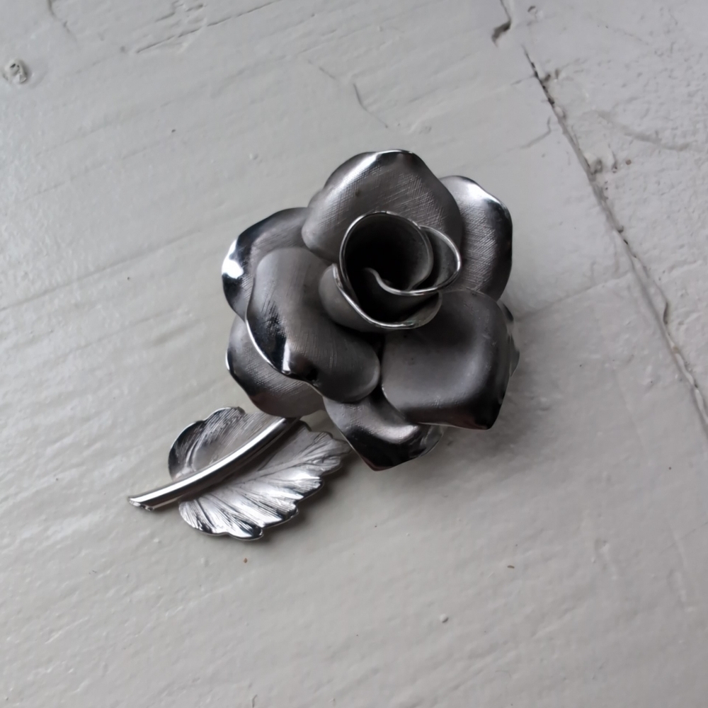 Silver tone rose brooch